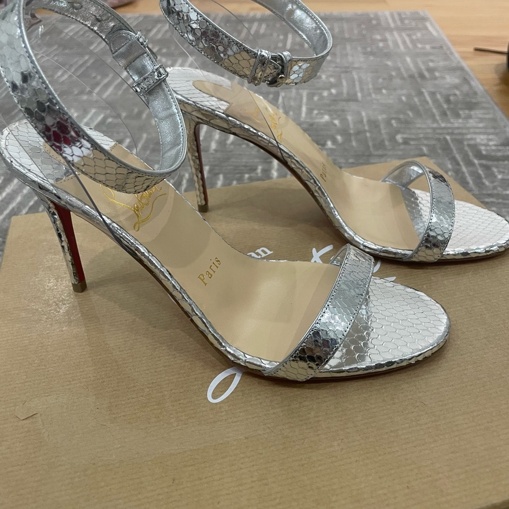 Christian Louboutin silver ankle strap heels 85mm. Brand new in the box.